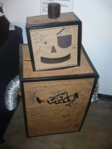Cardboard robot in the "gallery" part of the Rich Media Institute