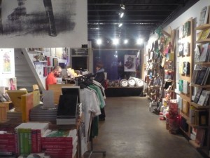 A wide shot of the "store" part of the Rich Media Institute, taken from the back.