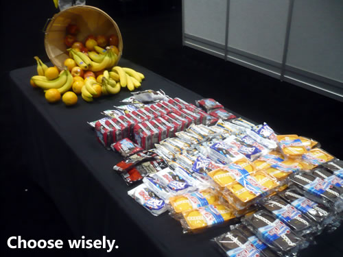 "Choose wisely": a snack table at PDC, with both junk food and fruits