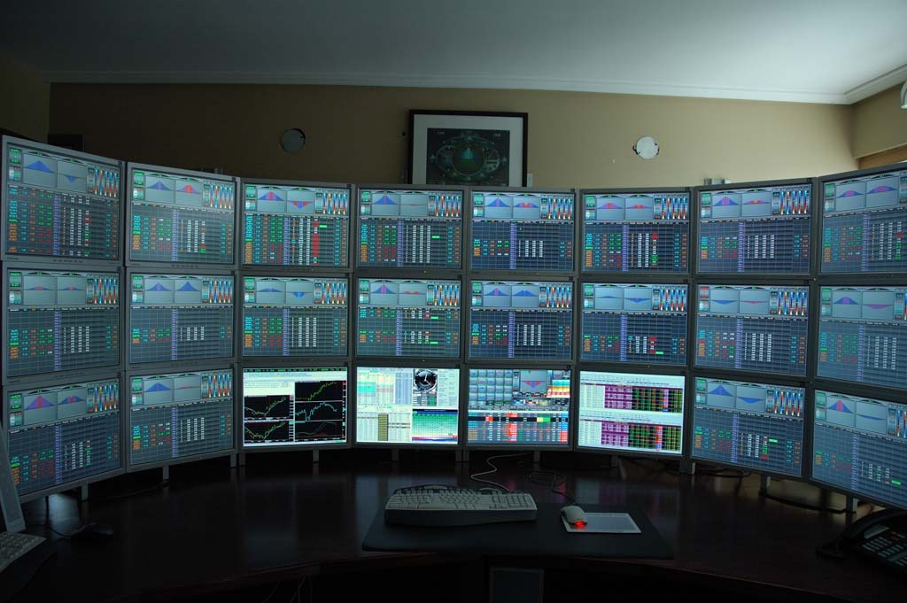 trading-desk-multiple-monitors.jpg