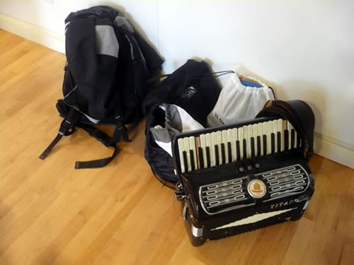 A couple of knapsacks and an old accordion