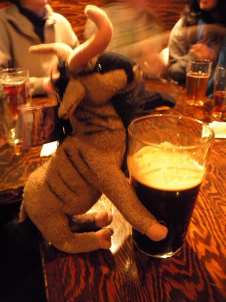 My plush gnu with a glass of oatmeal stout