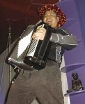 Joey deVilla and accordion, go-go dancing on a bar.