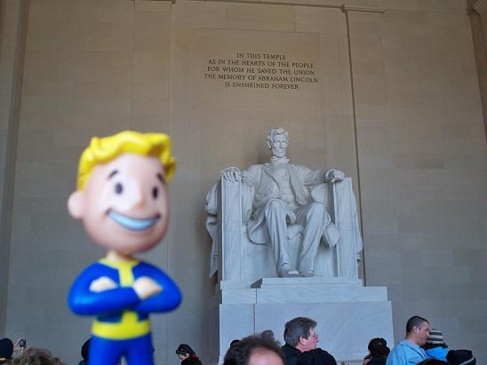 The Lincoln Memorial, with the "Vault Boy" bobblehead in the foreground