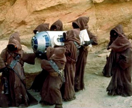 Jawas carrying R2-D2 in "Star Wars Episode IV: A New Hope"