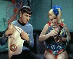 Spock and a space hippie, jamming on their instruments