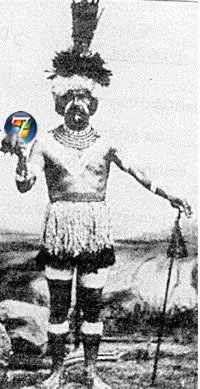 Shaman holding a Windows 7 logo
