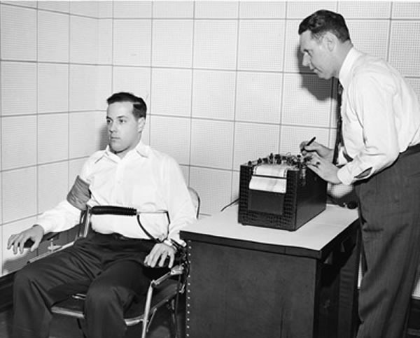 Black and white photo of a late 50s/early 60s-era polygraph exam