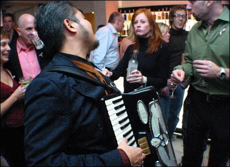 Joey deVilla working the room with his accordion