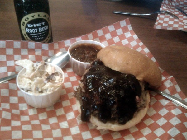 Pulled pork/brisket sandwich, coleslaw, beans and a bottle of Boylan's diet root beer