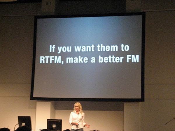 Kathy Sierra showing a slide that reads "If you want them to RTFM, make a better FM"