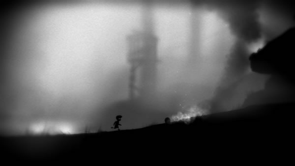 Limbo screenshot: the boys runs towards some rolling flaming logs