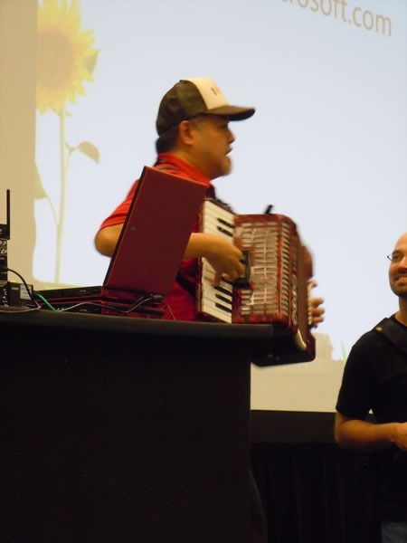 Joey deVilla plays accordion at Go DevMENTAL