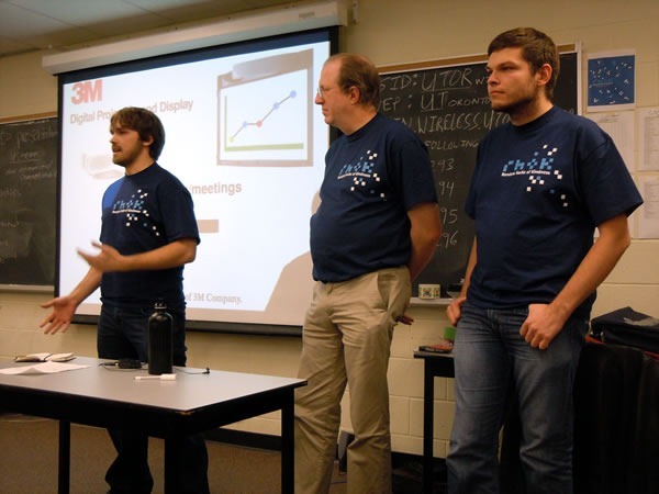 title "Population Centres" developers making their presentation