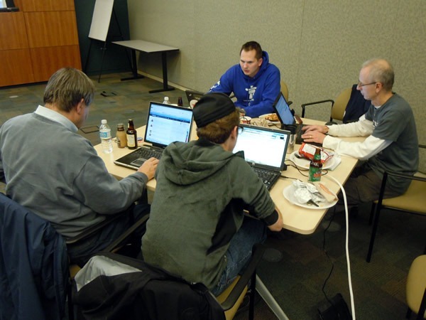 title Nik Garkusha and three other developers, working on their open data solution