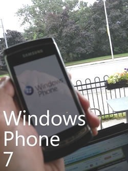 A Windows Phone 7 device, as seen held in Joey's hand, with High Park in the background