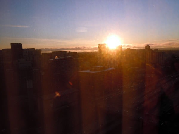 The sun rising over the Seattle skyline