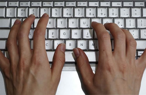 Hands on computer keyboard