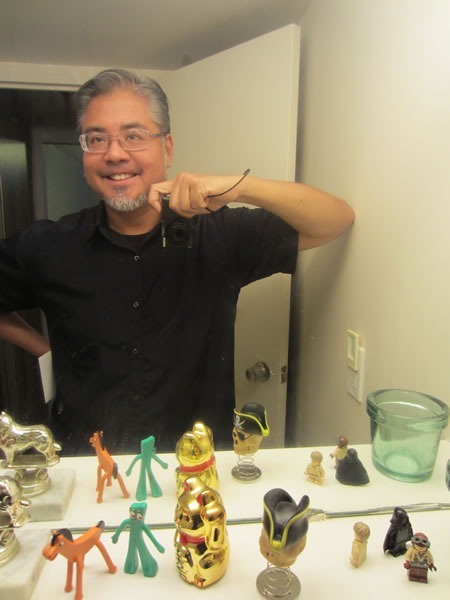 Self-portrait of Joey deVilla, taken in a mirror, showing off his new glasses