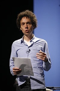 Photo of Malcolm Gladwell speaking at PopTech 2008. Photo by Kris Krug.