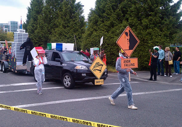 Windows Phone funeral with guy holding "ANDR FALLING" sign