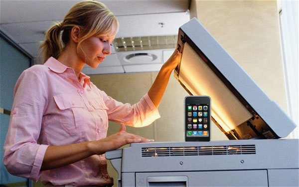 Photoillustration of a woman photocopying an iPhone.