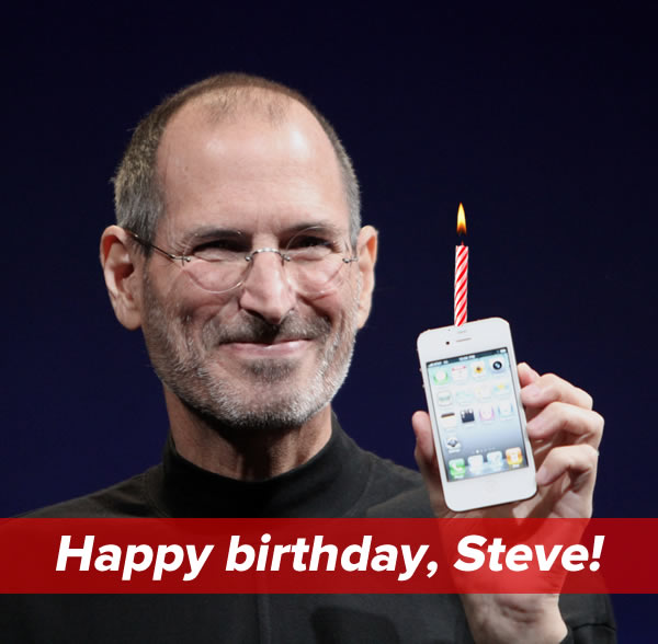 Happy birthday, Steve!: Steve Jobs holding up an iPhone with a candle on top.