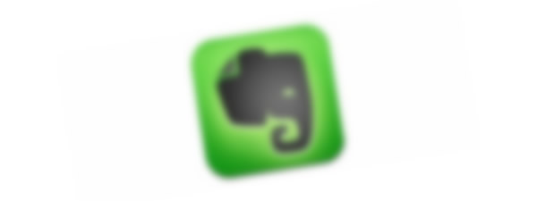 An out-of-focus Evernote icon.