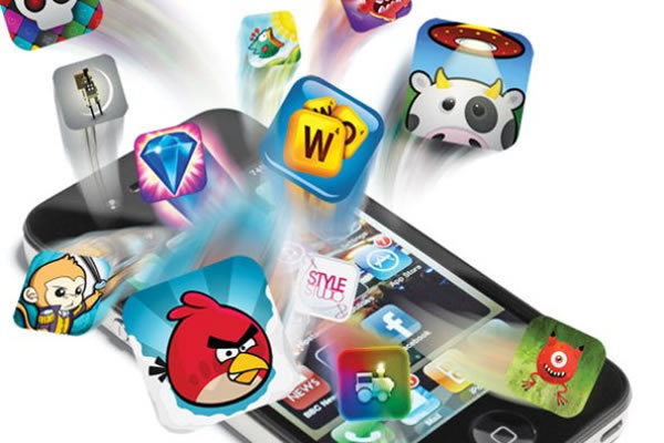 Icons of iOS games appearing to leap off the screen of an iPhone.