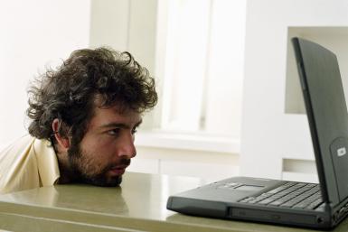 sad man at computer