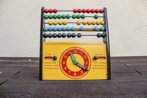 abacus with toy clock