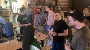 More people arrive at the “Coders, Creatives, and Craft Beer” meetup, 7venth Sun Brewery, Tampa, July 9, 2019.