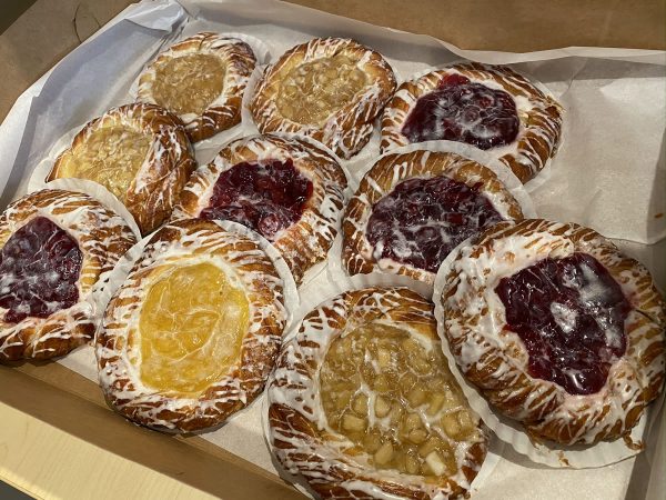 Photo: An assortment of apple and cherry danish pastries.