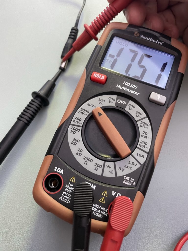 multimeter showing negative voltage Global Nerdy