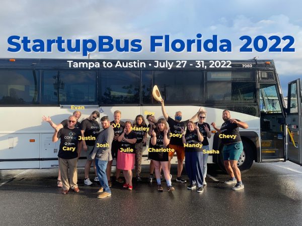 The riders of StartupBus Florida 2022. From left to right: Cary, Evan, Justin, Josh, VJ, Julie, Marley, Ray, Charlotte, Joey, Mandy, Sasha, and Chevy.