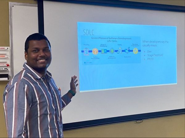 Sam Kasimalla gives a talk at Tampa Code Camp 2022.