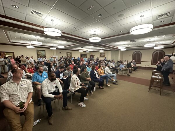 A packed main room watching Jeremy Rasmussen being honored.