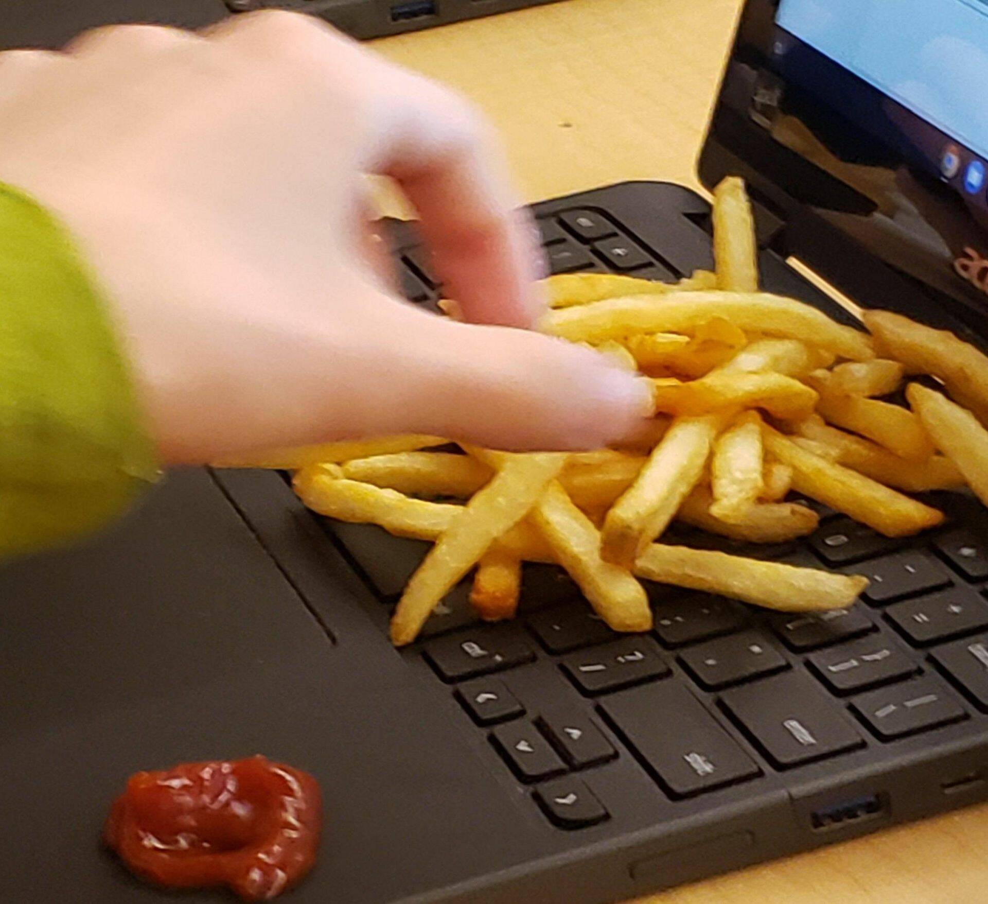 fries-and-ketchup-on-laptop